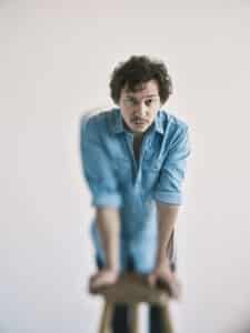 a man in a blue shirt